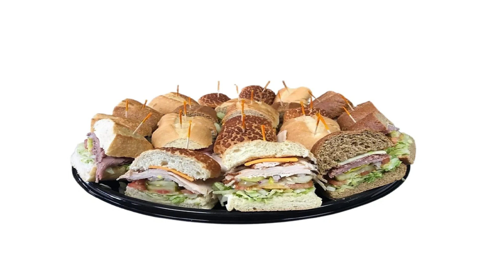 Catering platter of mixed sub sandwiches on Dutch-crunch, white and wheat rolls, cut into sections on a round black tray